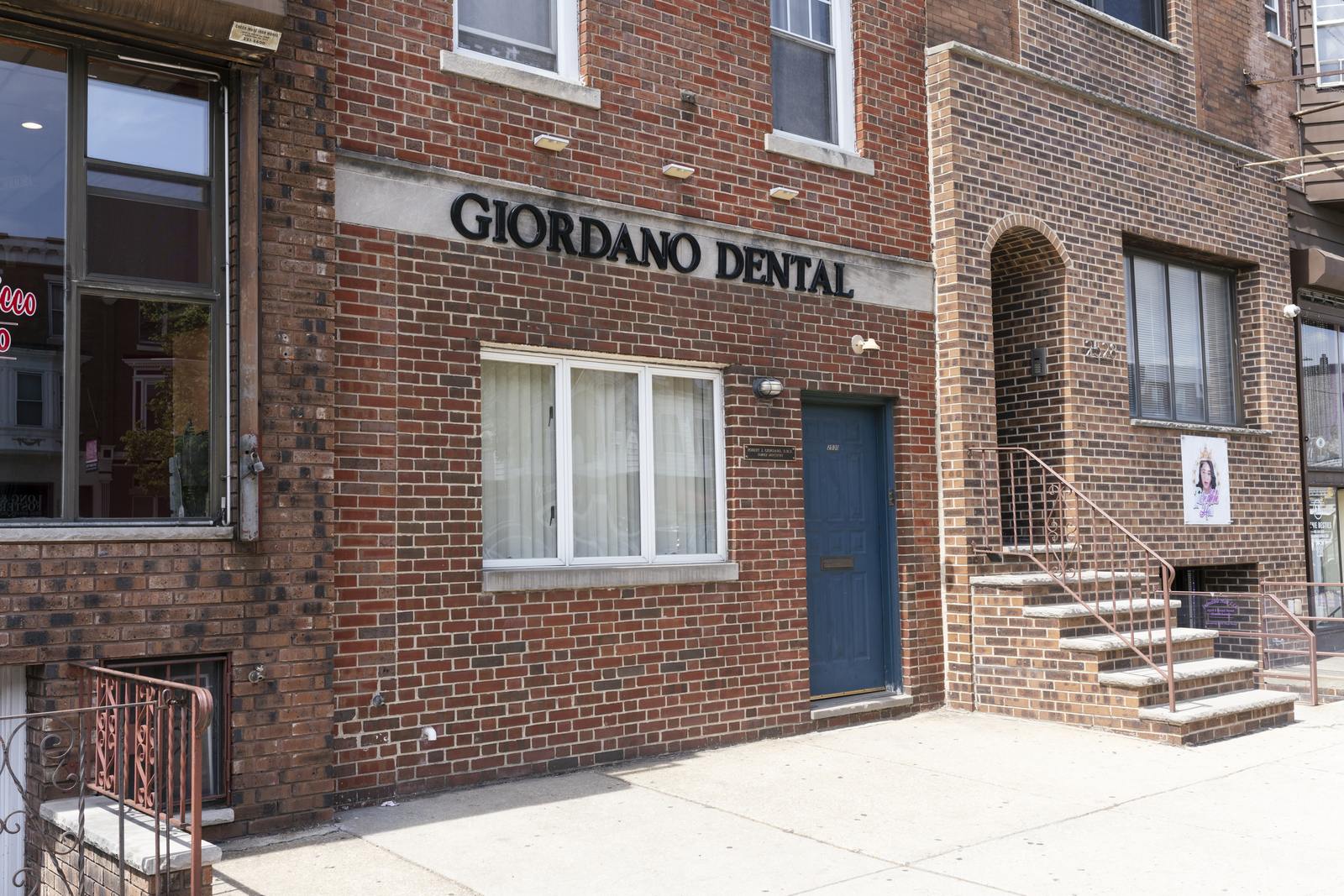 The Giordano Dental storefront on South Broad Street, seen from the sidewalk