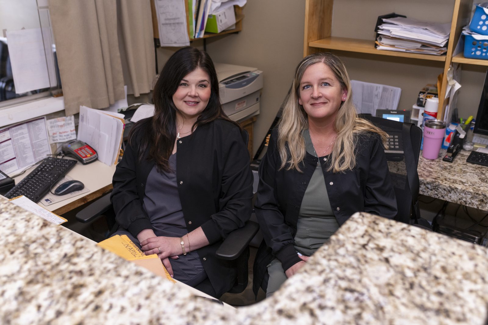 Lauren and April at the reception desk